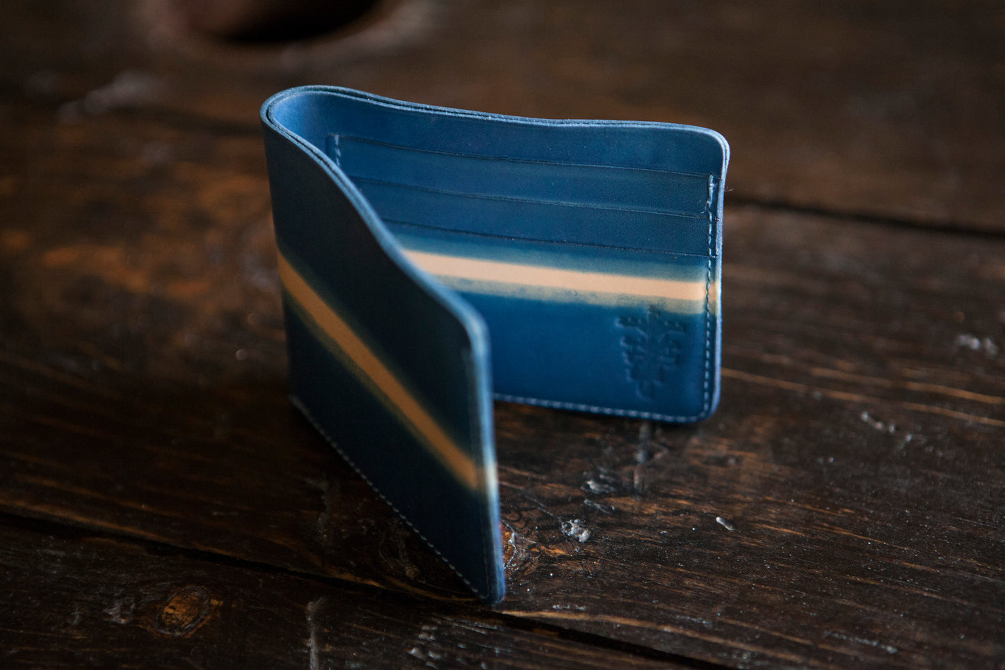 Indigo Dip Dyed Natural Vegeable Tanned Leather Bifold with "laser" pattern